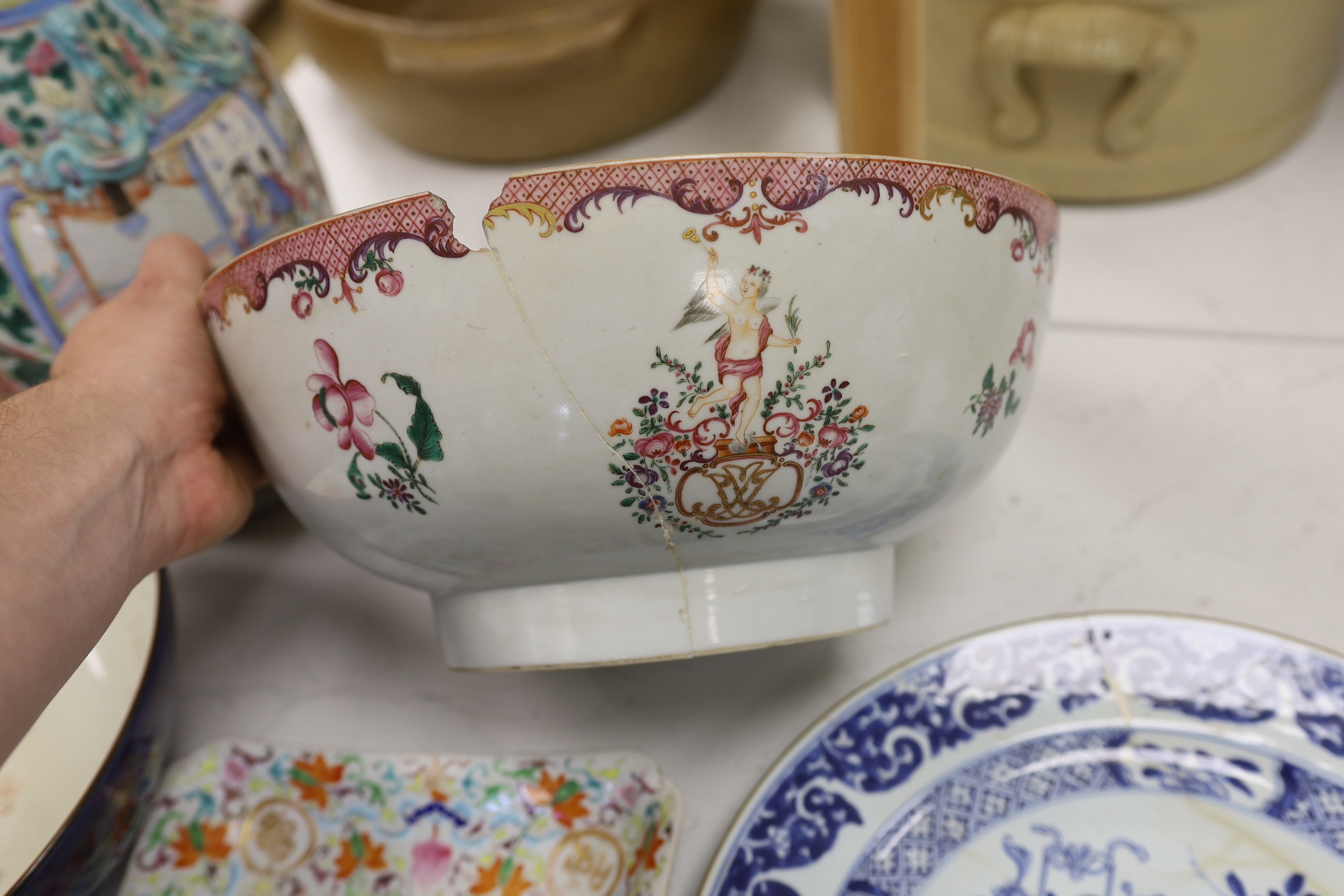 A group of 18th/19th century Chinese and Japanese ceramics to include - a famille rose vase, two large bowls, a blue and white plate and four other pieces, the largest 35cm high